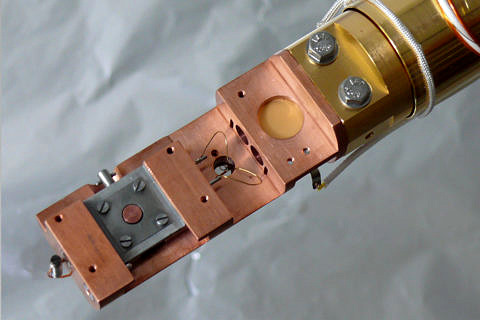 Copper sample manipulator head with Molybdenum sample holder. A Cu single crystal is mounted inside the sample holder.